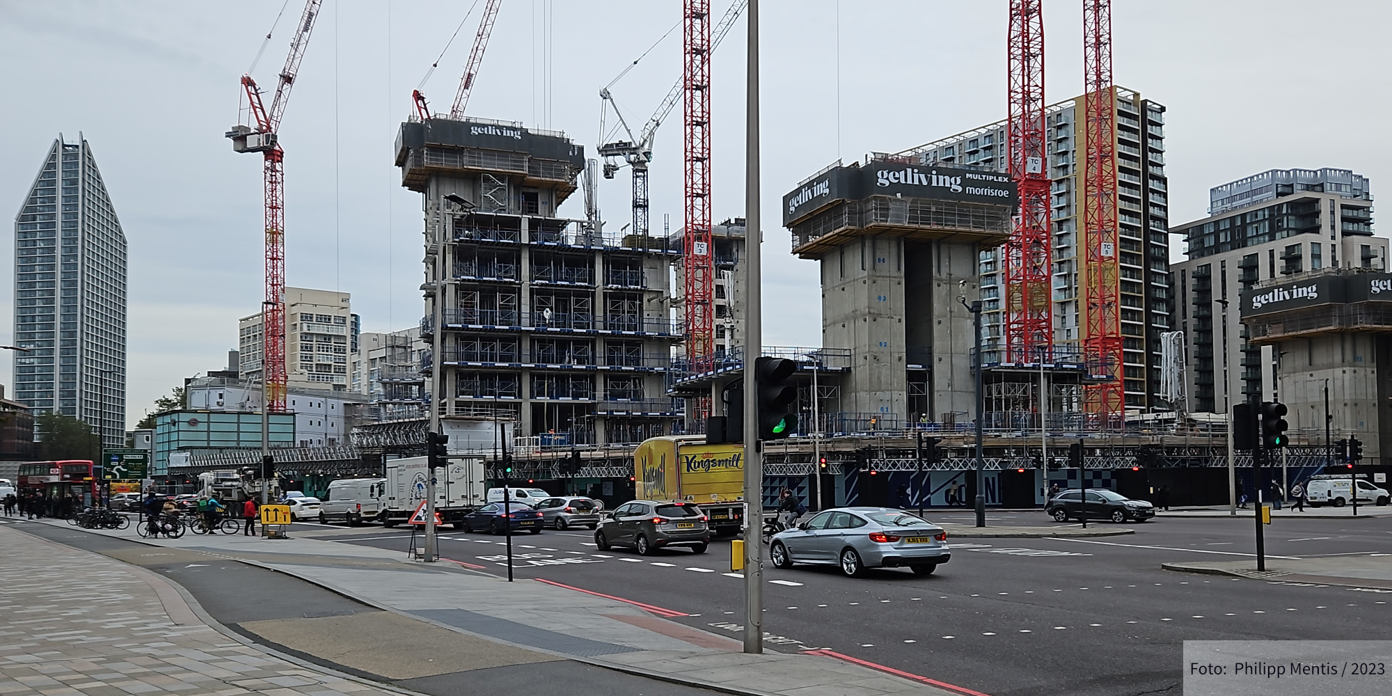 !B A London street marked by high-rise construction projects.