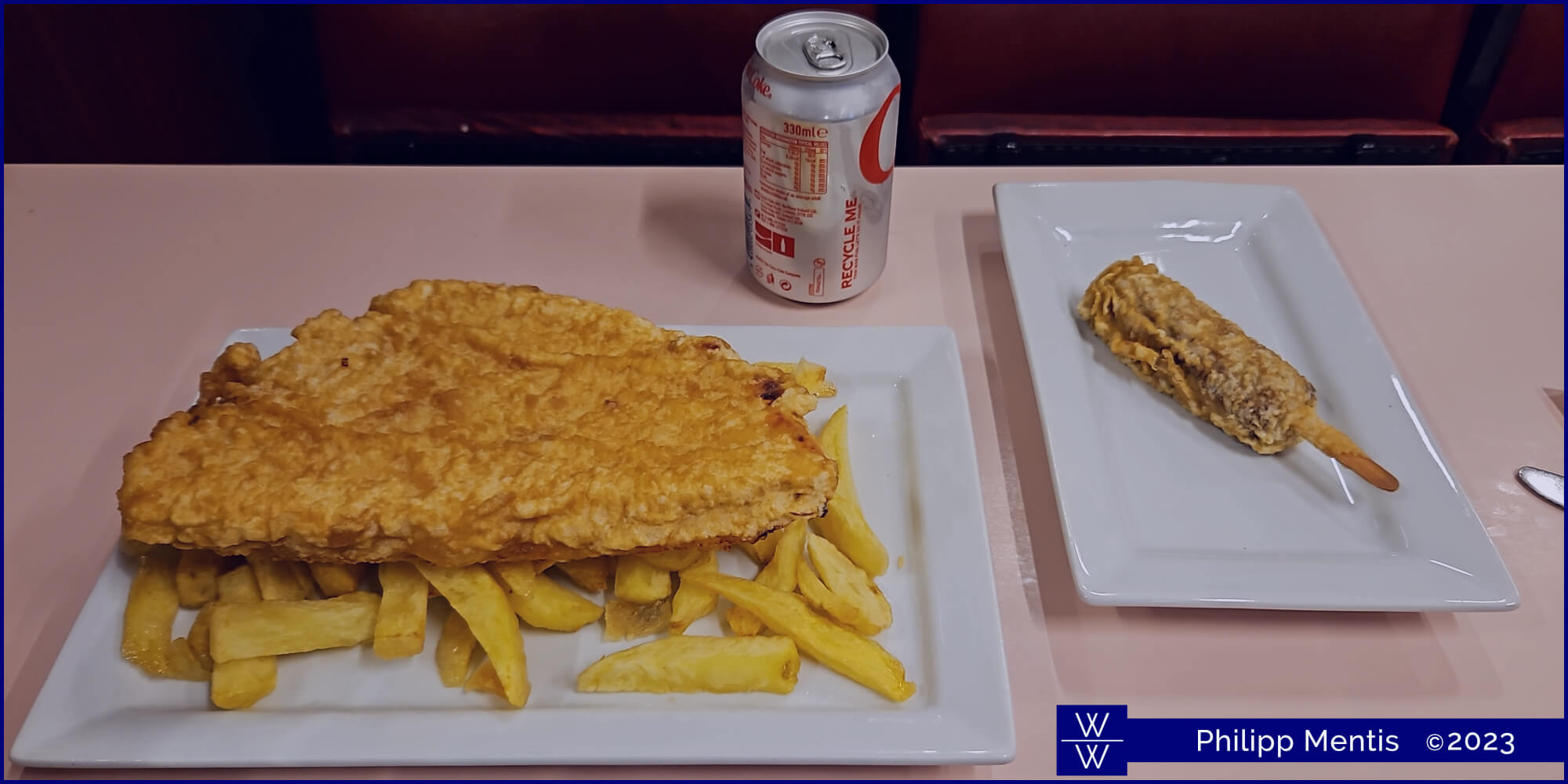 !B A food arrangement consisting of the famous Glasgow pizza crunch, along with a can of diet Coke and the fried Mars bar.