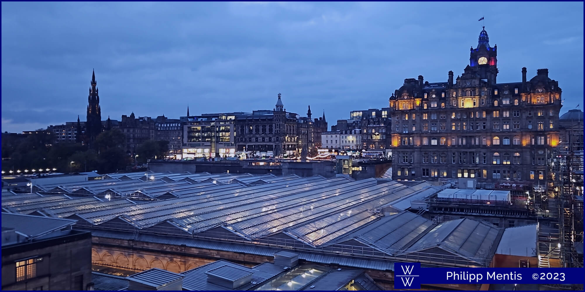 !B Waverley train station in Edinburgh is covered with an array of silvery glass roofs.